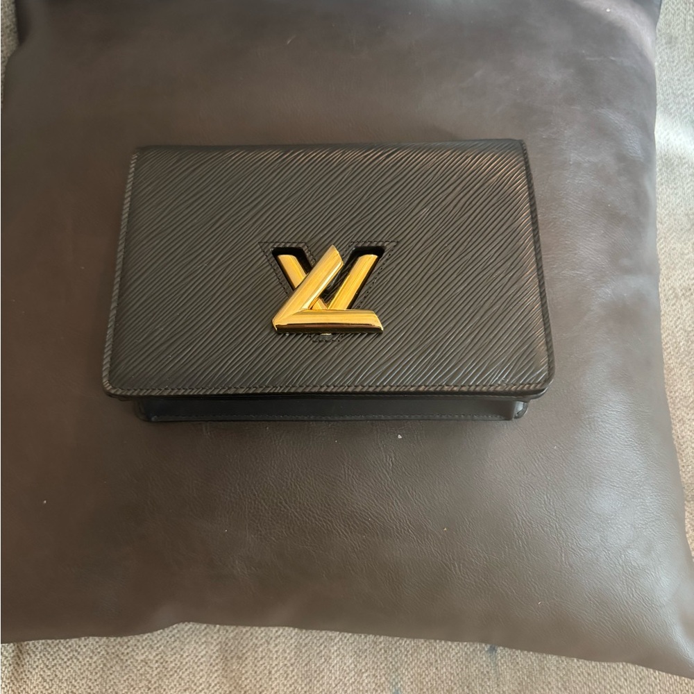 Louis Vuitton Black Twist Wallet with Gold Accent